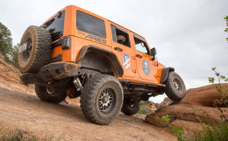 Orange Offroad Jeep Wrangler Rock Team ARIES